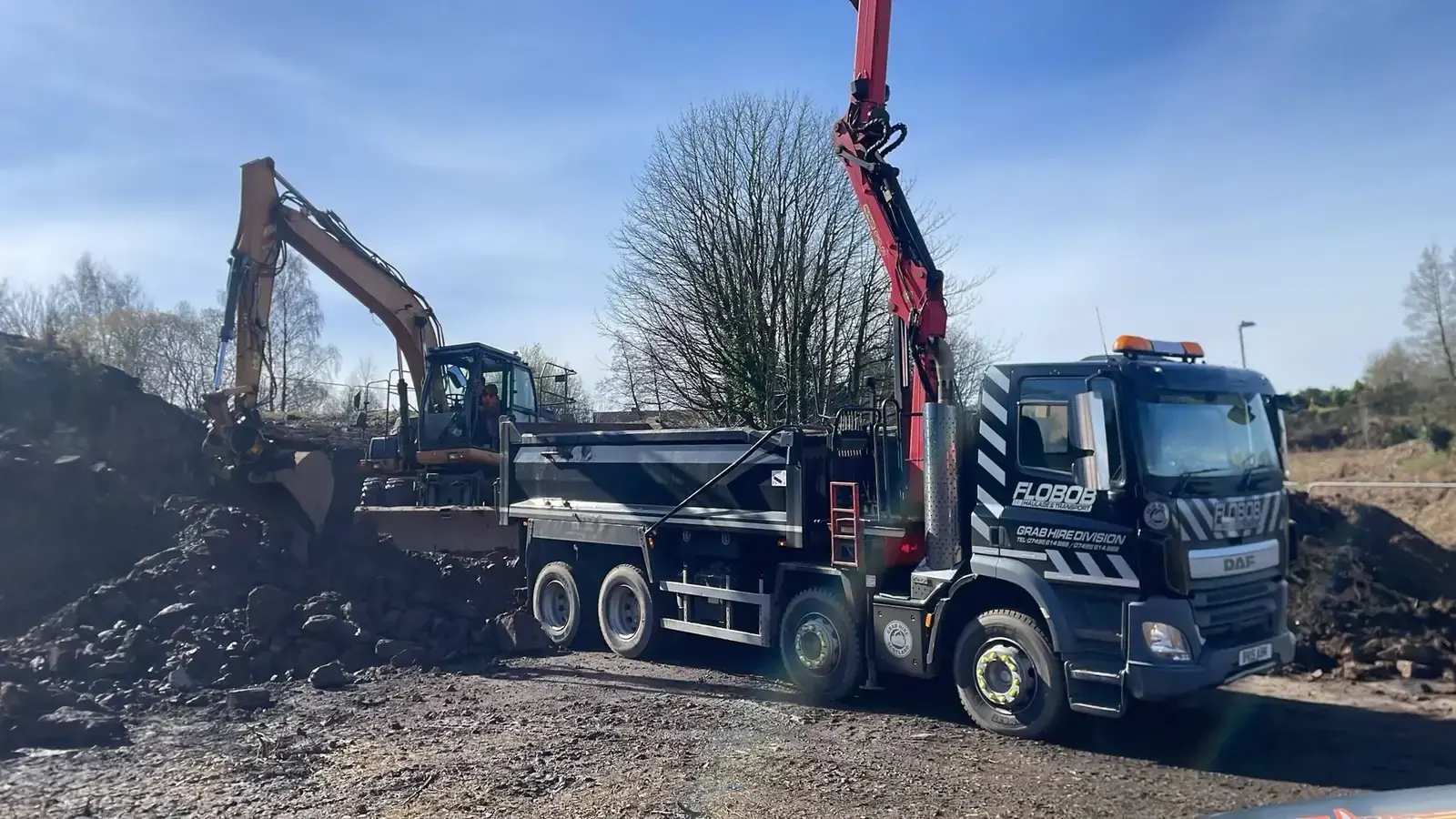Grab Hire Scotland truck working on a construction project