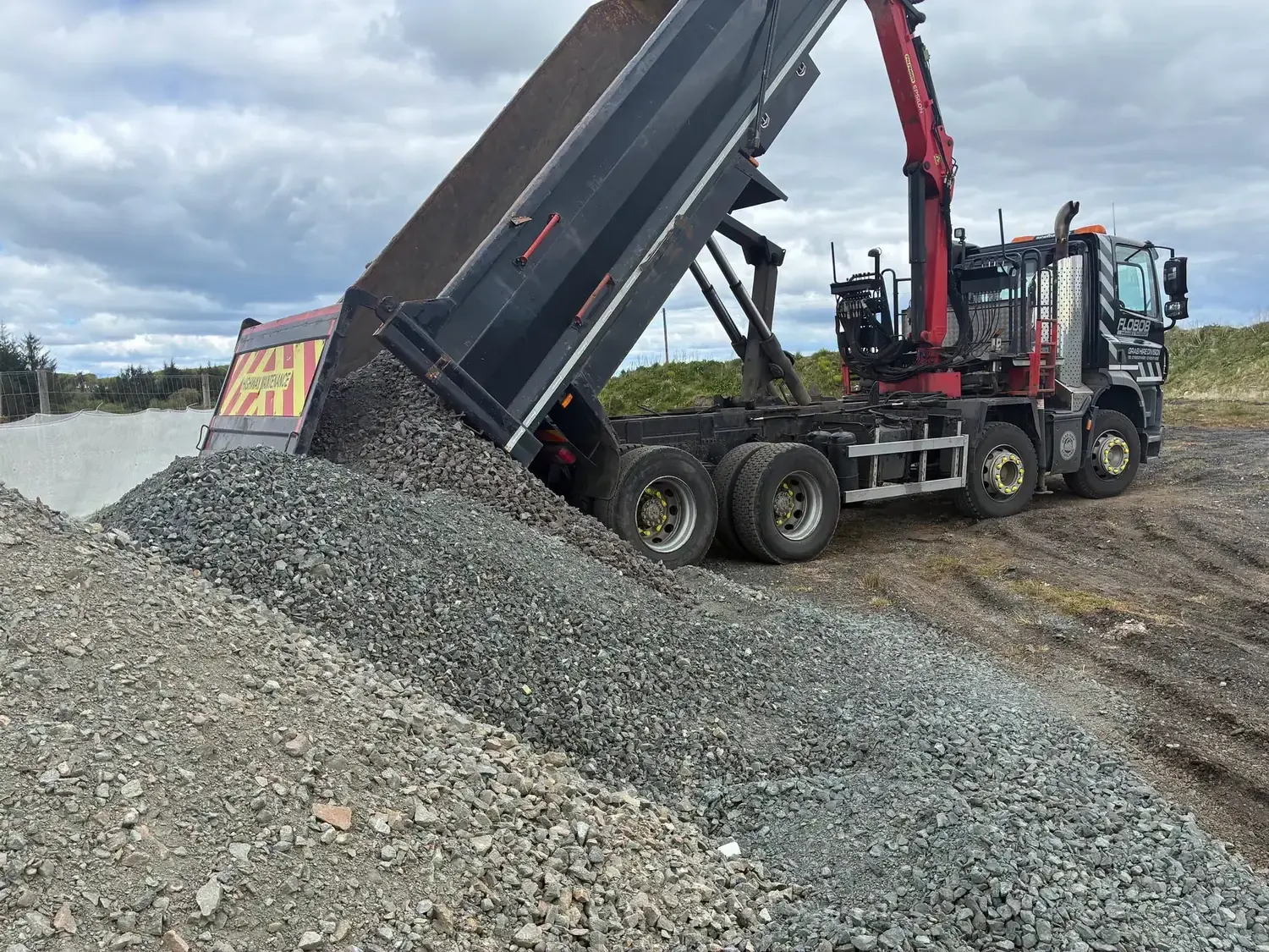Grab Hire Scotland tipper delivering crushed aggregate